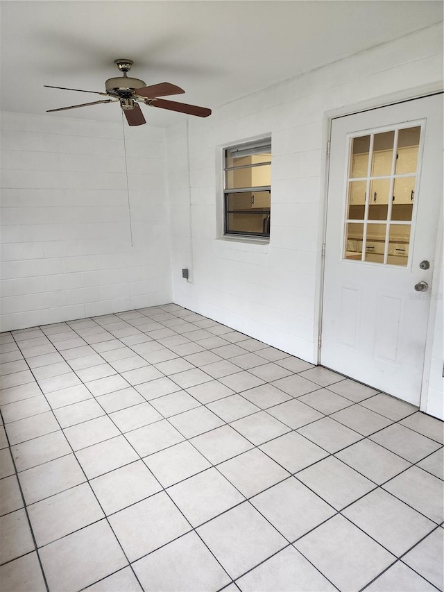 interior space featuring ceiling fan