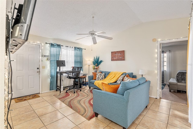 living room with a healthy amount of sunlight and light tile patterned floors