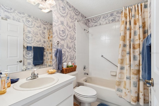 full bathroom with vanity, shower / tub combo, a textured ceiling, and toilet