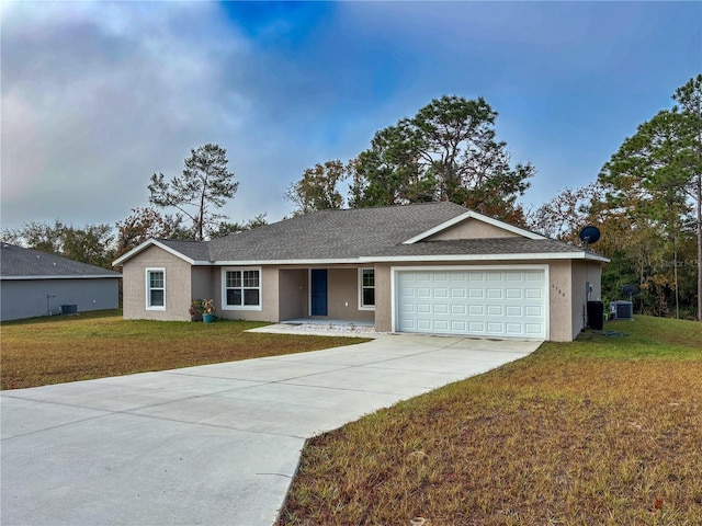 ranch-style home with a garage, central air condition unit, and a front lawn