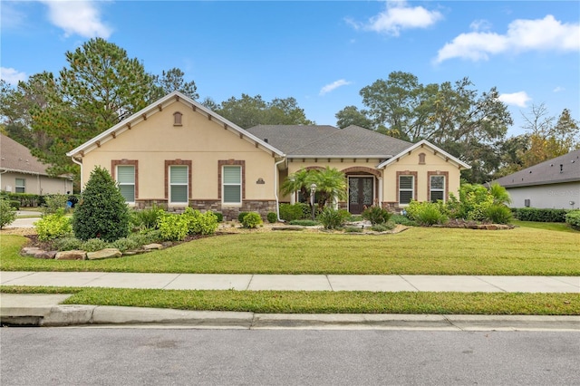 view of front of home with a front yard