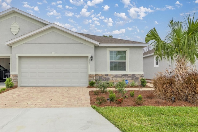 single story home featuring a garage