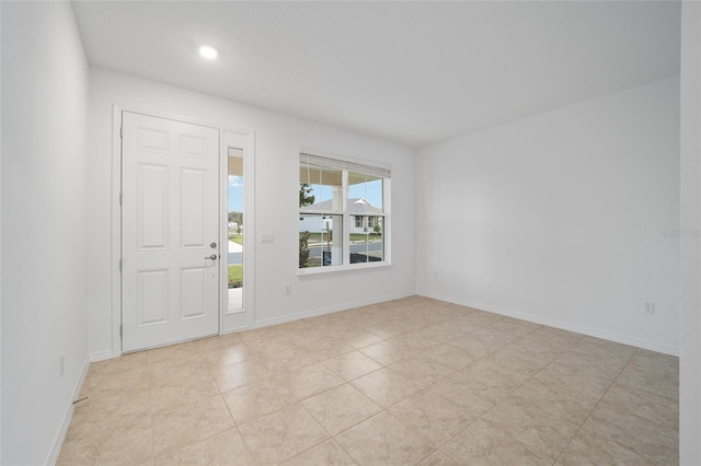 view of tiled foyer entrance