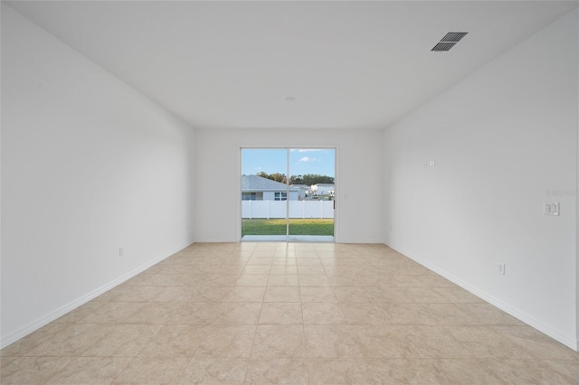 view of tiled spare room