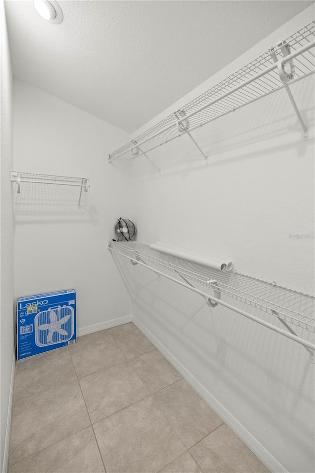 walk in closet featuring tile patterned floors