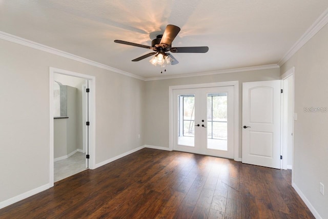 spare room with french doors, dark hardwood / wood-style flooring, ceiling fan, and crown molding