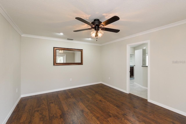 unfurnished room with dark hardwood / wood-style floors, ceiling fan, and ornamental molding