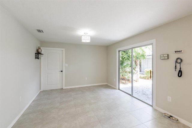 view of tiled spare room