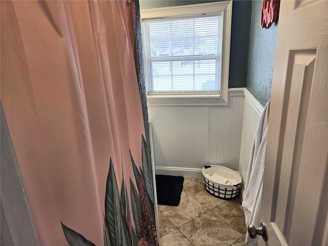 bathroom featuring tile patterned flooring