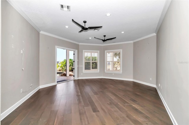 empty room with ceiling fan, dark hardwood / wood-style floors, and ornamental molding