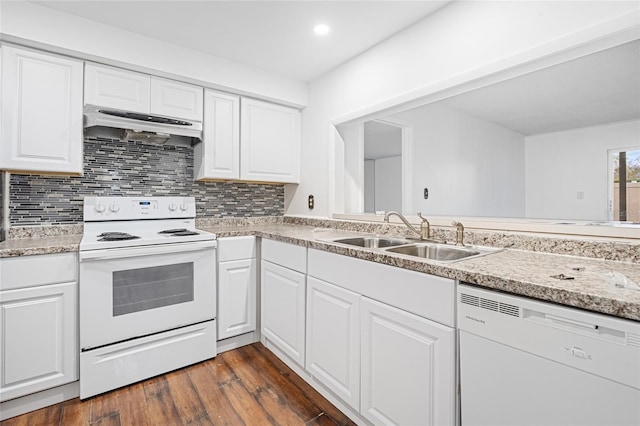 kitchen with sink, tasteful backsplash, dark hardwood / wood-style flooring, white appliances, and white cabinets