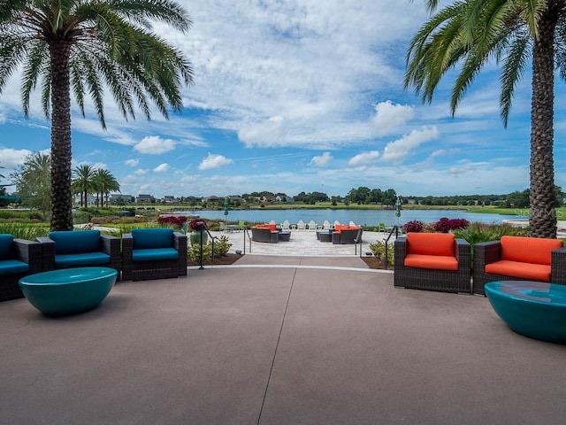 view of patio / terrace featuring an outdoor hangout area and a water view