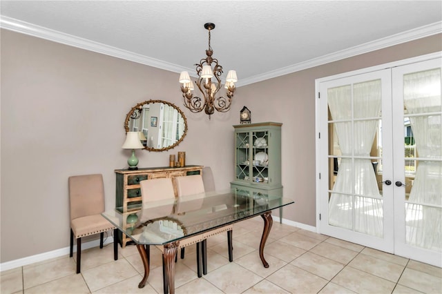 dining room with ornamental molding, light tile patterned floors, a chandelier, and french doors