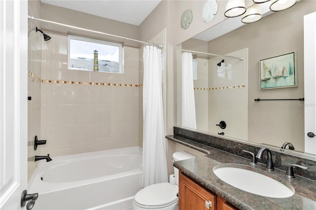 full bathroom featuring vanity, toilet, and shower / bathtub combination with curtain