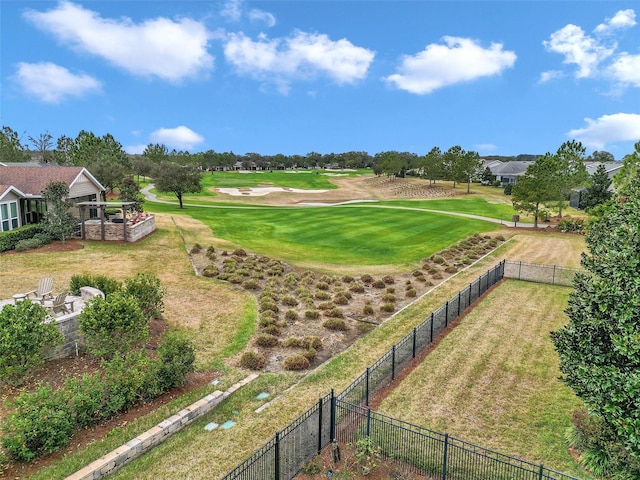 view of home's community with a lawn