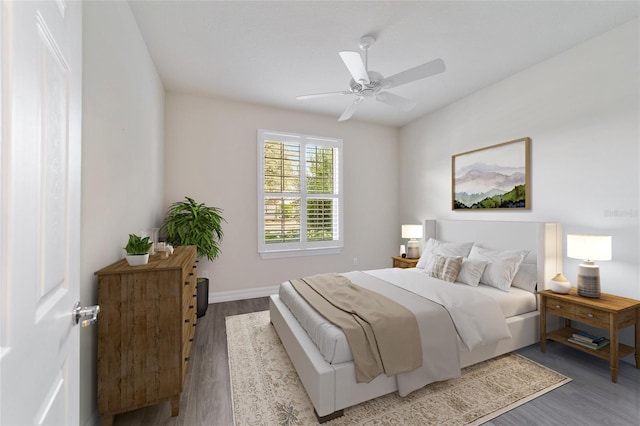 bedroom featuring ceiling fan and hardwood / wood-style floors