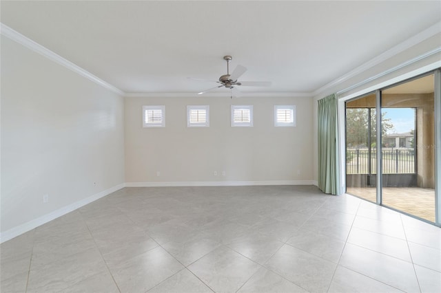 unfurnished room featuring a wealth of natural light, ceiling fan, light tile patterned floors, and ornamental molding