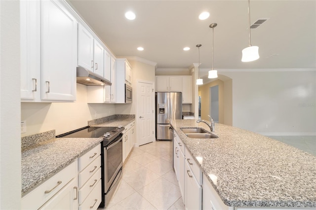 kitchen featuring stainless steel appliances, crown molding, sink, a center island with sink, and white cabinets