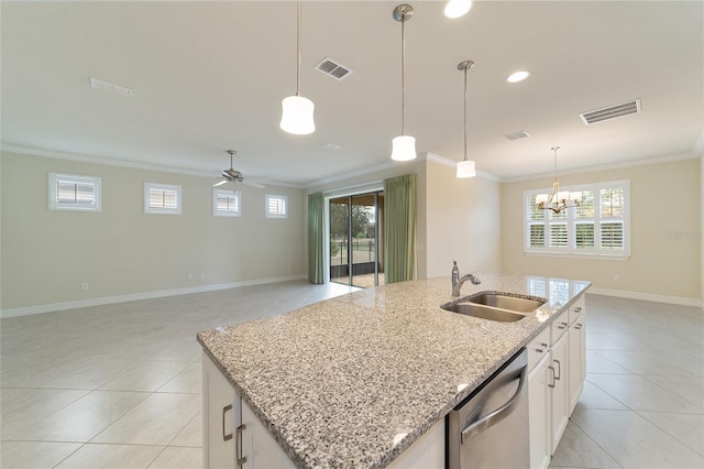 kitchen with white cabinets, ceiling fan with notable chandelier, dishwasher, and sink