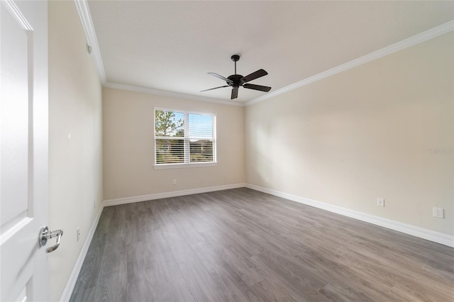 spare room with hardwood / wood-style flooring, ceiling fan, and ornamental molding