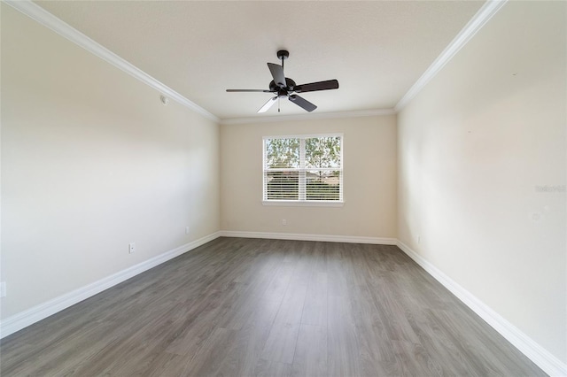 spare room with hardwood / wood-style flooring, ceiling fan, and ornamental molding