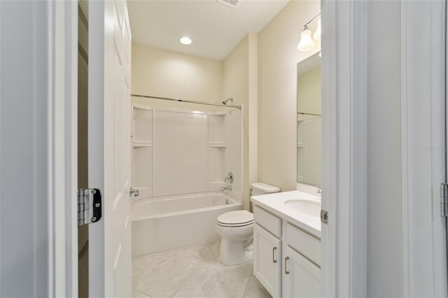 full bathroom with tile patterned floors, bathing tub / shower combination, vanity, and toilet