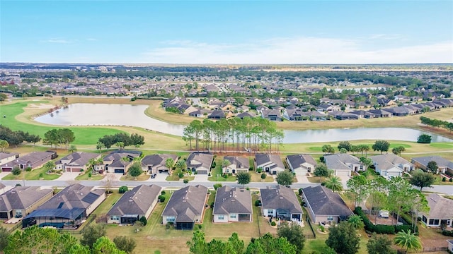 drone / aerial view with a water view