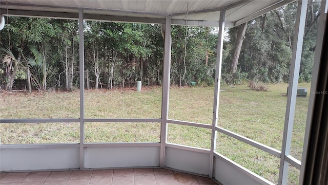 unfurnished sunroom featuring plenty of natural light