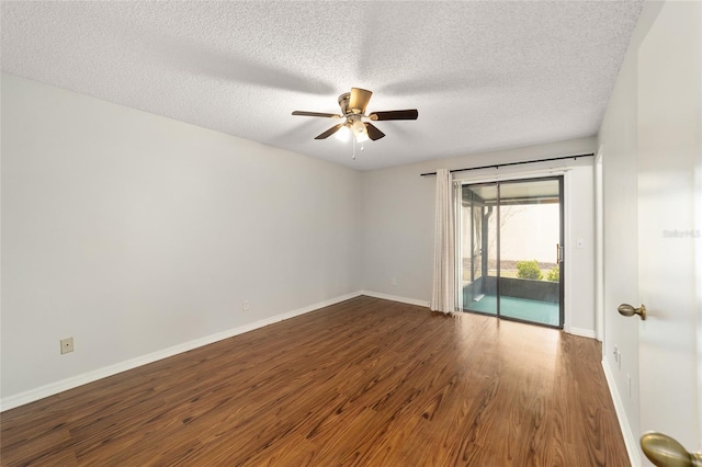 spare room with a textured ceiling, hardwood / wood-style flooring, and ceiling fan