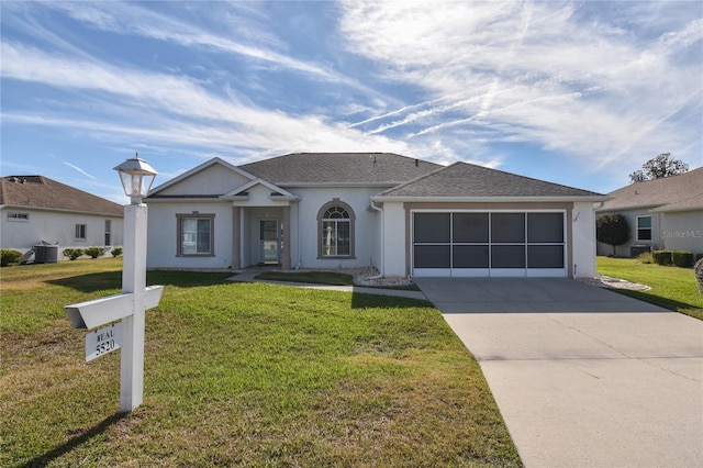 5520 NW 26th Ln, Ocala, FL 34482 - single story home with cooling unit, a garage, and a front yard