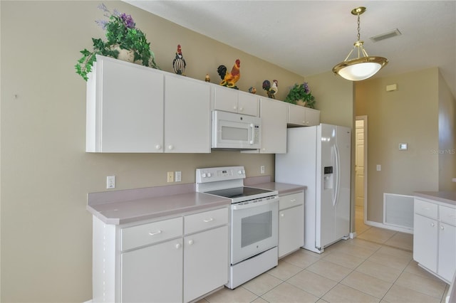 kitchen featuring white cabinetry, white appliances, hanging light fixtures, and light tile patterned floors