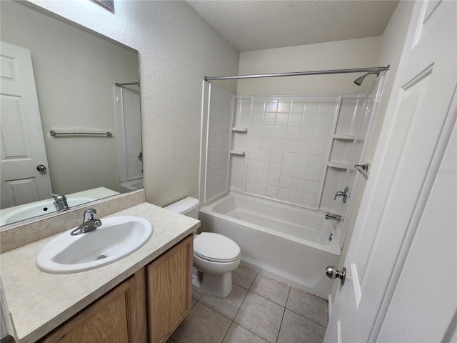 full bathroom featuring vanity, bathing tub / shower combination, tile patterned flooring, toilet, and a textured ceiling