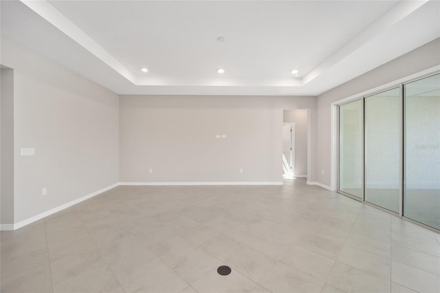 interior space with a tray ceiling