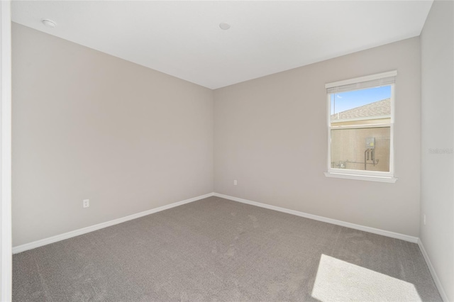 view of carpeted spare room