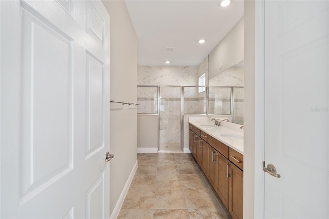 bathroom with vanity and walk in shower