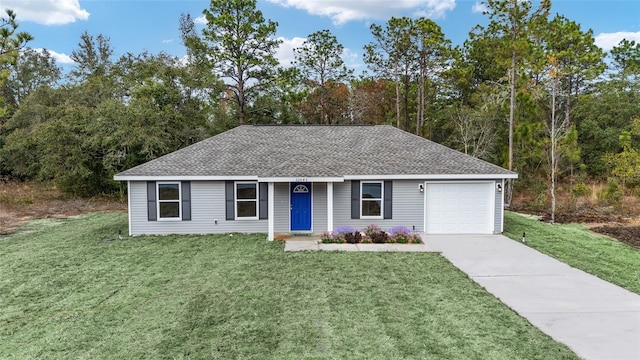 ranch-style house with a front yard and a garage