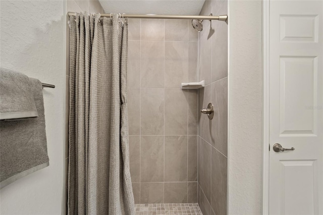 bathroom featuring curtained shower