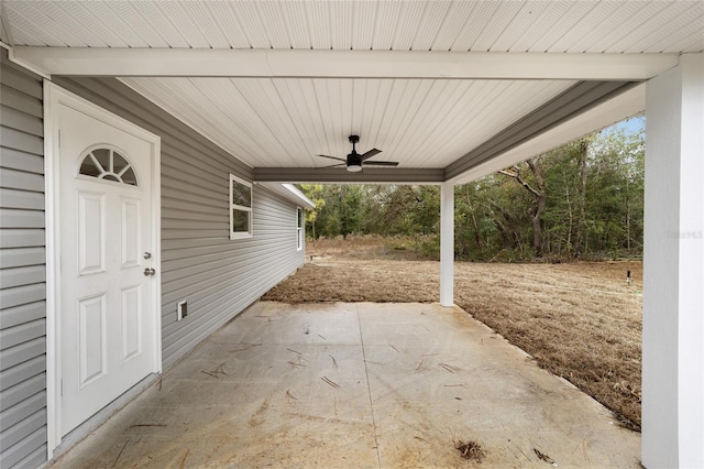 view of patio featuring ceiling fan