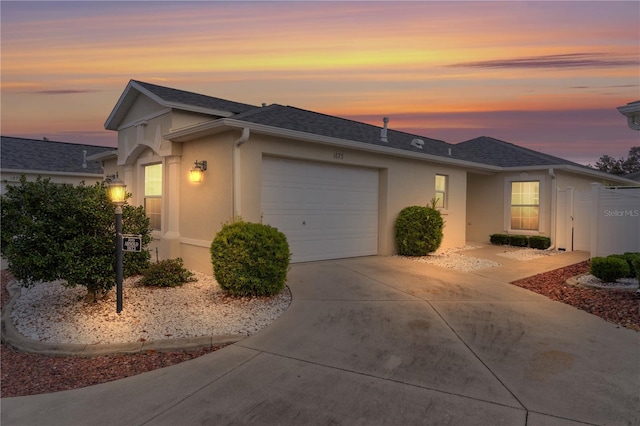 view of front of property featuring a garage