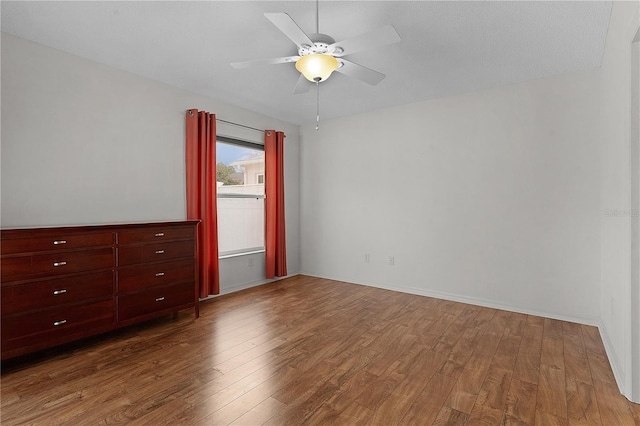 interior space featuring ceiling fan and wood-type flooring