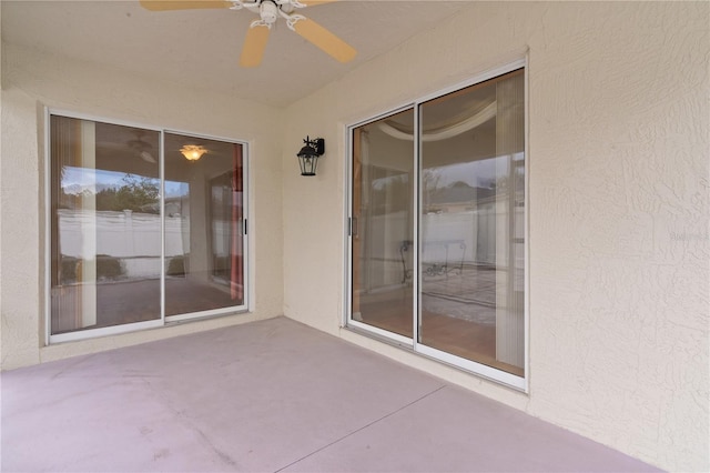 view of patio with ceiling fan