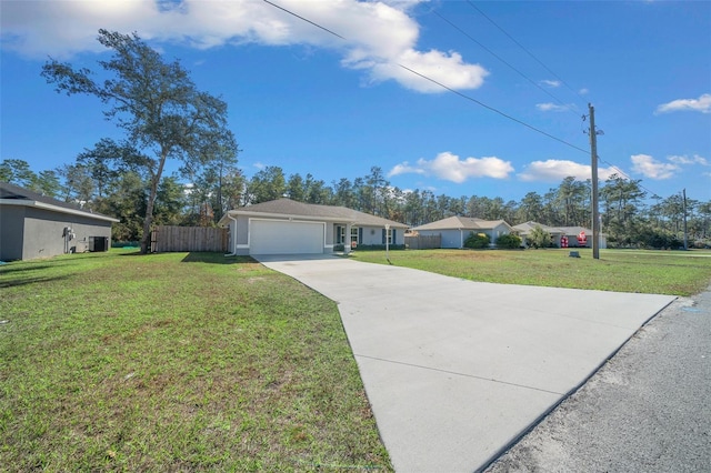 single story home with a front yard and a garage