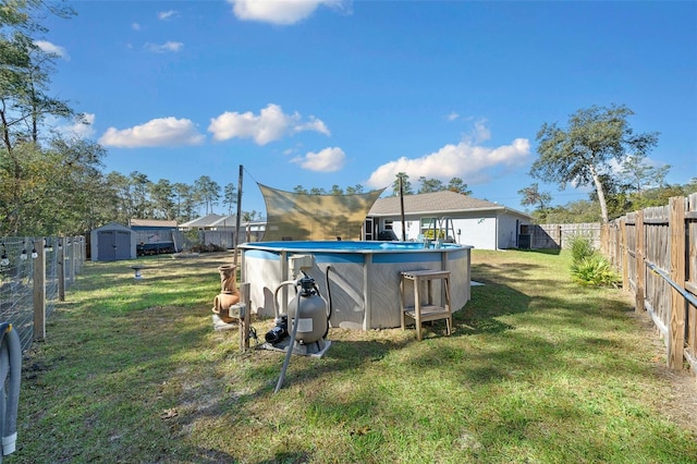 view of yard with a fenced in pool and a storage shed