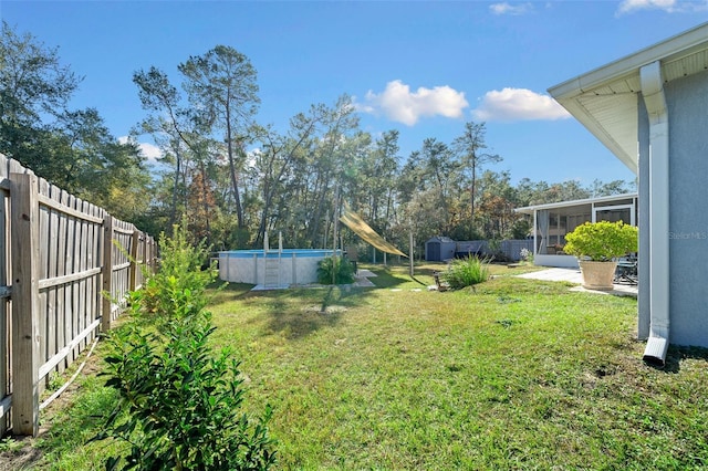 view of yard with a sunroom