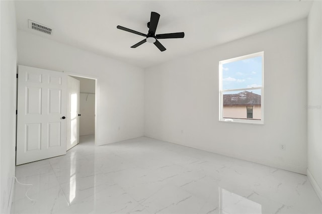 spare room featuring ceiling fan