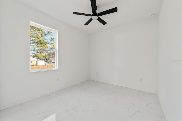 unfurnished room with ceiling fan