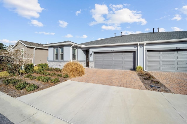 single story home featuring a garage