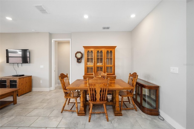 dining room featuring light tile patterned floors