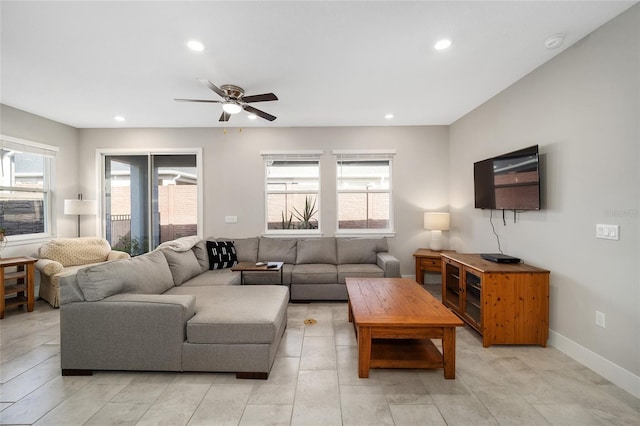 living room featuring ceiling fan