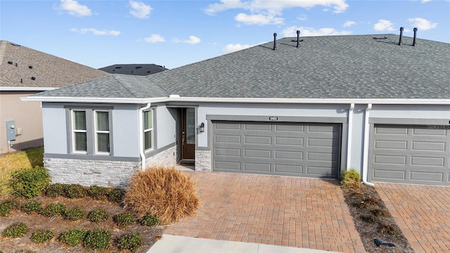 single story home featuring a garage